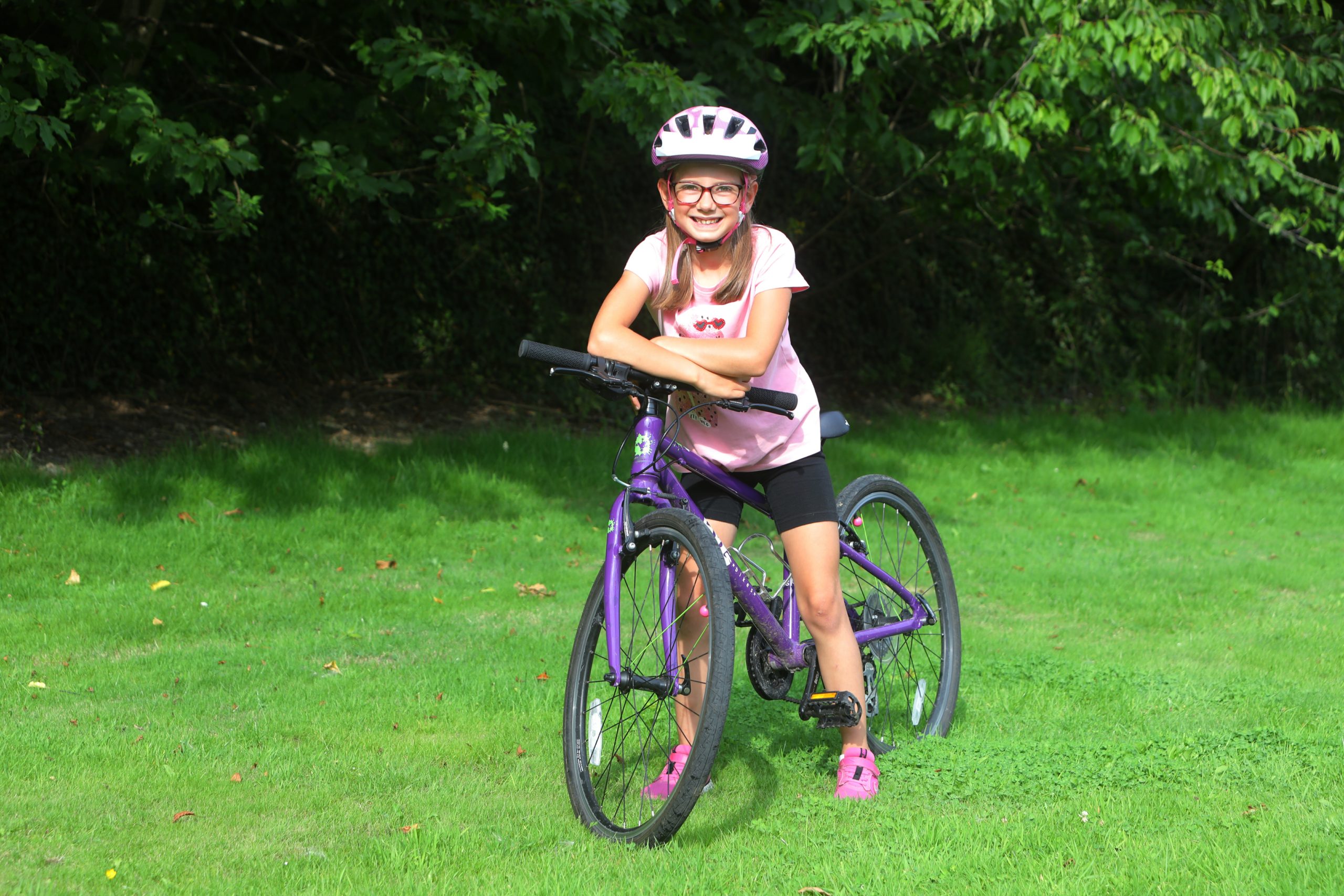 Katie has cycled 1000 miles on her favourite purple bike
