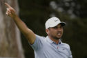 Jason Day of Australia, watches his tee shot on the sixth hole during the first round of the PGA Championship.