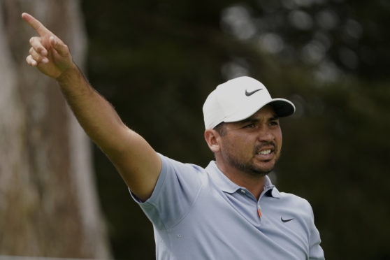 Jason Day of Australia, watches his tee shot on the sixth hole during the first round of the PGA Championship.