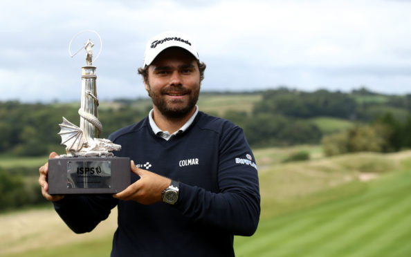 France's Romain Langasque with the ISPS Handa Wales Open trophy.
