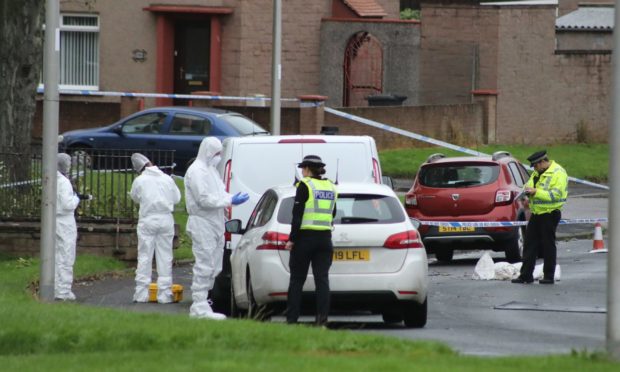 Police in the Spittalfield area of Arbroath following the death of Frankie Melvin.