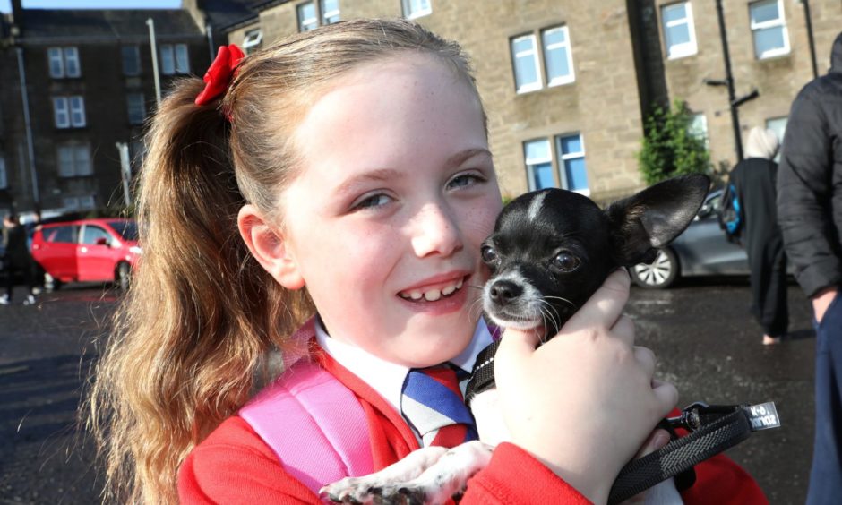 Victoria Park Primary 4 pupil Grace Gorrie says goodbye to her dog, Boston