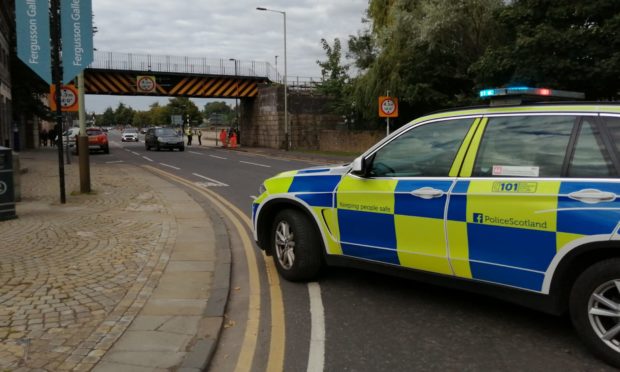 Police on Tay Street, Perth, Monday afternoon.