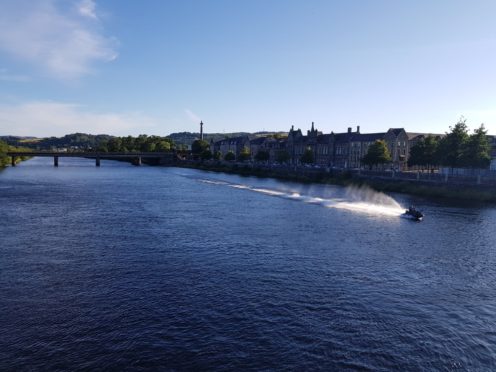 Jet skier on the River Tay at Tay Street, Perth.