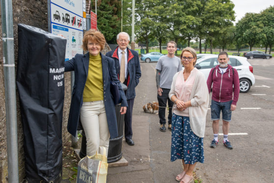 Businesspeople Katherine McLean, Charles Jarvis, John Blake, Amanda Duncan and Stuart Pirie are among those from 60 Forfar businesses calling for parking charges to be dropped.