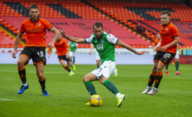 Christian Doidge scores the winner for Hibs against Dundee United.