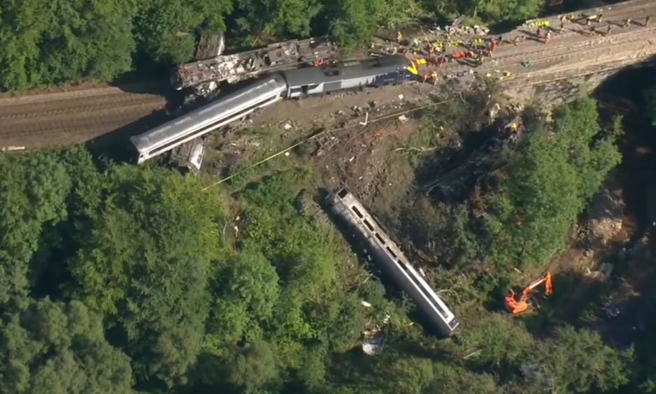 Aerial images showing the derailed train near Stonehaven.
