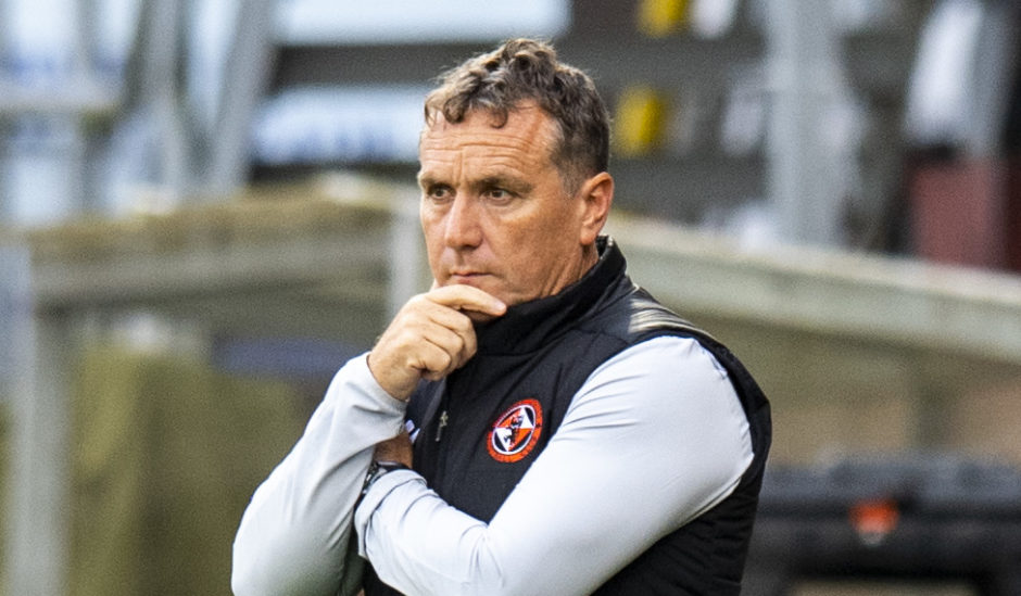 Micky Mellon looks on during Hibs clash.