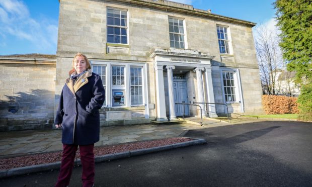 Trudy Duffy-Wigman of Fossoway and District Community Council outside Bank of Scotland in Kinross.