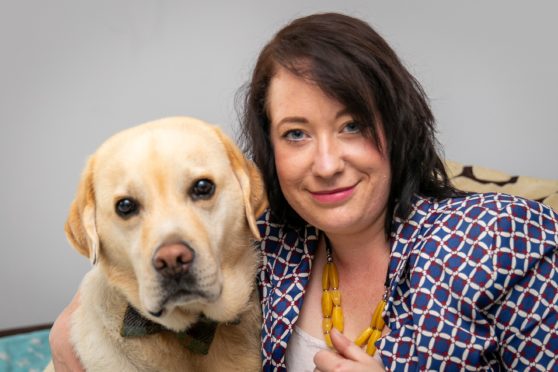 Judith Alexander with her beloved pet labrador Gulliver.