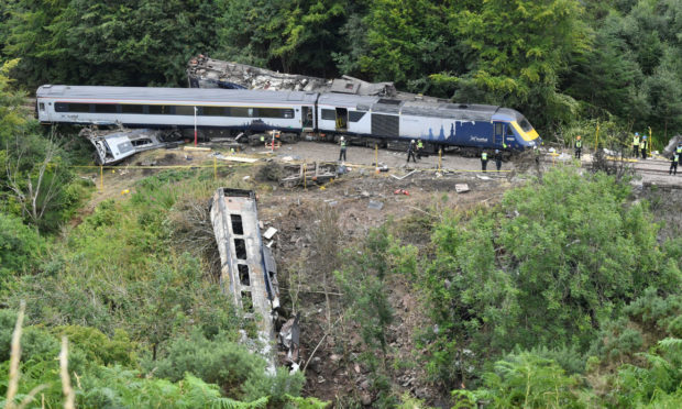 The scene near Stonehaven, Aberdeenshire, following the derailment of the ScotRail train which cost the lives of three people.