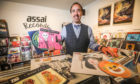 Keith Ingram, owner of Assai Records, with some of this year's Record Store Day releases.