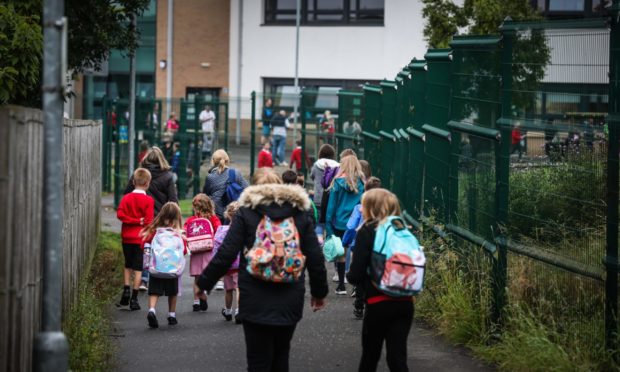 Parents drop off their children at Newhill Primary, Blairgowrie.