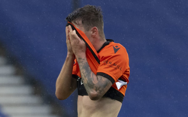 Frustrated United player Jamie Robson during the 4-0 defeat.