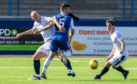 Charlie Adam in action for Dundee at Montrose.