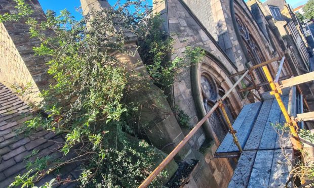 Work is under way to clear shrubbery and vegetation from St Andrew's and St Stephen's Church in Perth.