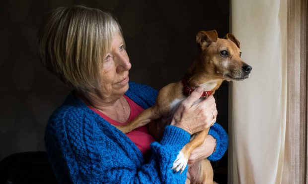 Lesley Whittet, with her other dog Peppa, has been has been left distraught by the weekend incident.