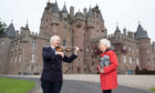 Mary, Dowager Countess of Strathmore is making a visit to the family home of Glamis Castle to meet with Sandy to pick up a copy of the latest volume