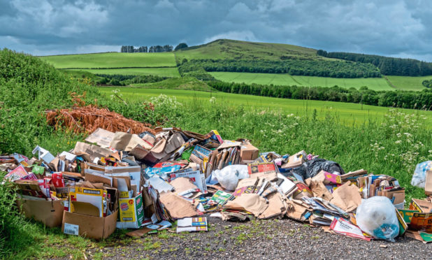 An example of fly-tipping on the outskirts of Auchterhouse, near Dundee.