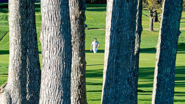 Bryson DeChambeau, of the United States, walks up the 16th fairway during the final round of the US Open Golf Championship, Sunday, Sept. 20, 2020, in Mamaroneck, N.Y. (AP Photo/Charles Krupa)