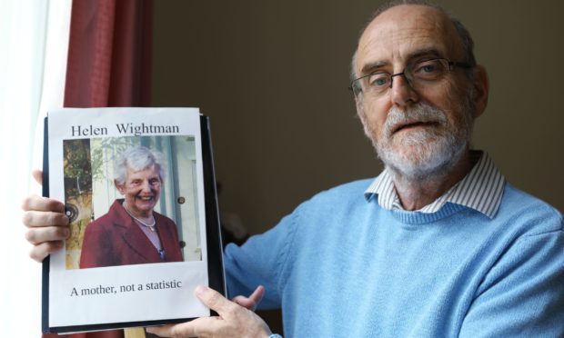 Alan Wightman with a picture of his late mother, Helen.