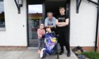 Allan Petrie at home in Dundee, with his grandchildren Megan Sinclair, 11, Ronald Sinclair,13, and Poppy Petrie, 5, have all been in isolation