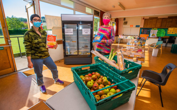 Liz Barrett and volunteer Olive Andre at expanded new food community service