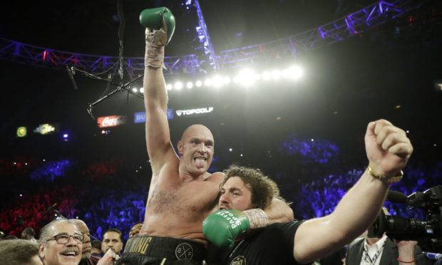 Tyson Fury celebrates after defeating Deontay Wilder during a WBC heavyweight championship boxing match on Saturday, February 22 2020.