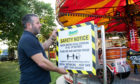 Christian Horne checks the new safety advice notices