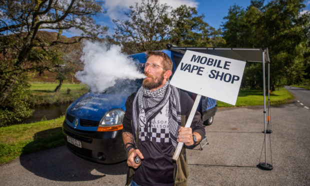 Demis Cunningham with his Scotland's first Mobile Vape Shop.