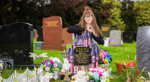 Natasha-Lee McGilligan by Roxie's graveside.