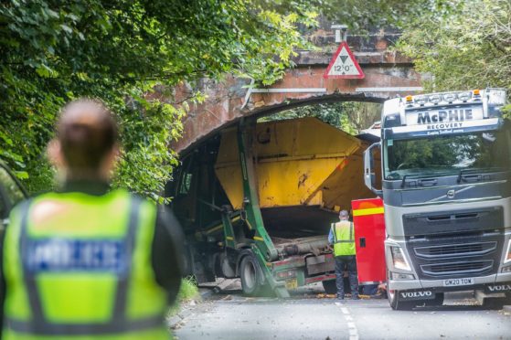 The Fife Council operated vehicle struck the bridge close to Oakley.
