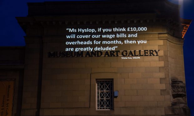 Quotes from a letter to the Scottish Government demanding arts support were projected onto Perth Museum and Art Gallery and the Perth Concert Hall by an anonymous campaign group.