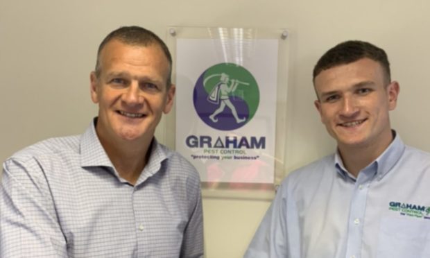 Ross Graham (left) welcomes son Jamie to the Graham Pest Control business graduate trainee programme