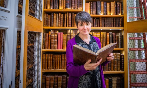 Keeper of the Books Lara Haggerty in the Library of Innerpeffray Library. Photo: Steve MacDougall / DCT Media