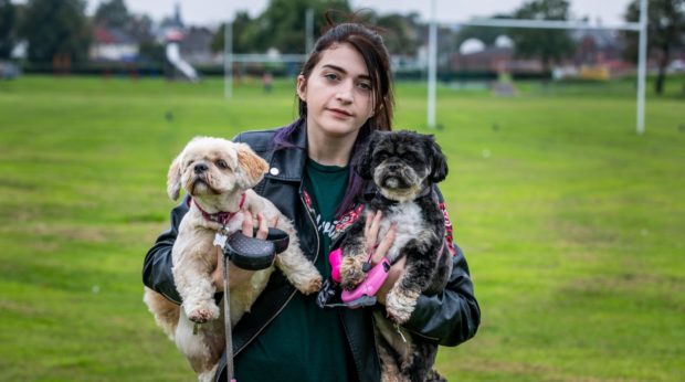 Hayley Burt with her dogs Macy and Lola, who were attacked by a Jack Russell Terrier dog in Rosyth Public Park.