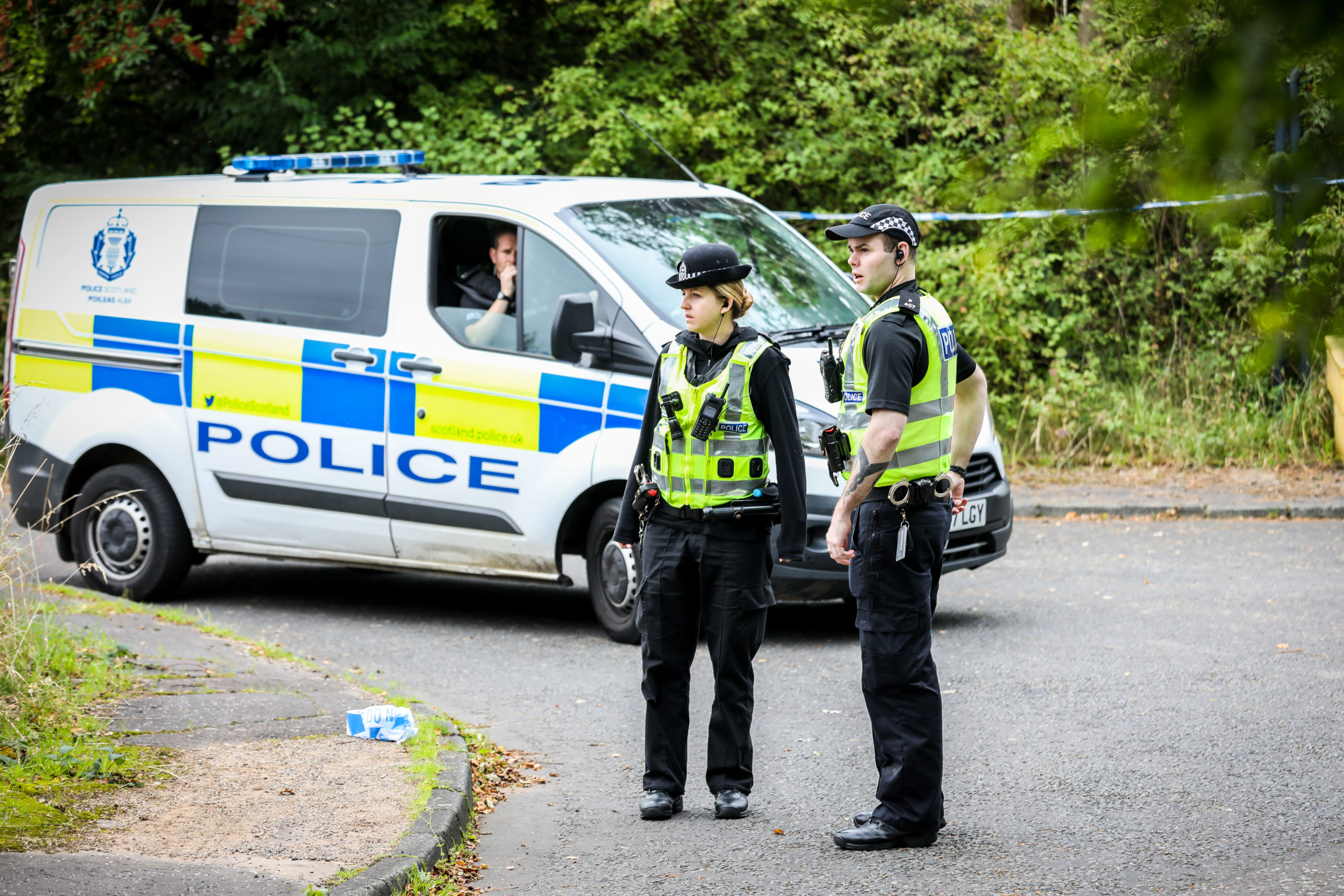 Police at Whitehill industrial estate where the body was discovered.