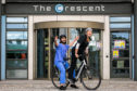 Medical Student Fareed Nadeem and Dr BEcky Forrester with the new eBikes used for patient visits. Whitfield Surgery, based at The Crescent in Dundee has become Scotland’s first GP surgery to use eBikes to carry out house visits