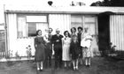 Jim Crumley's family in the front garden at 97 Glamis Road following his christening.