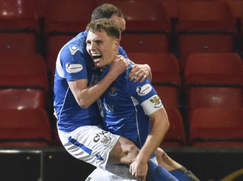 Chris Kane celebrates his winner against Motherwell with Jason Kerr.