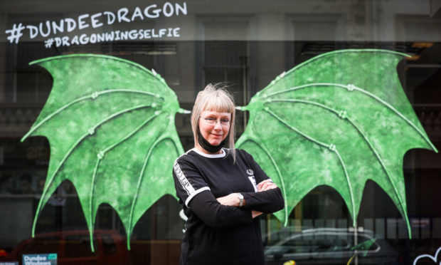 Tracey Stewart with her, 'Dundee Dragon Wings Selfie' on Reform Street.