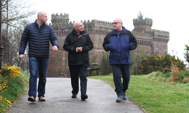 Councillor Derek Wann, Mr George Park and Councillor David Fairweather previously discussed work on the Keptie water tower.
