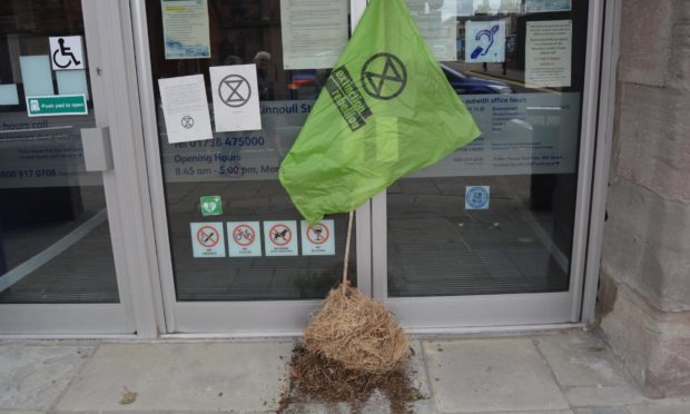 Playpark soil is dumped outside council offices in Perth.