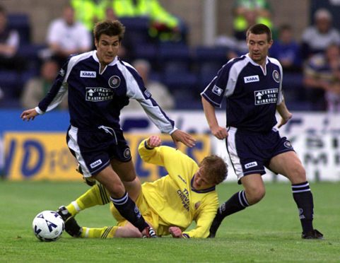 Mike Yates in action for Dundee.