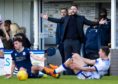 Dundee manager James McPake appeals for a free kick during Dundee's last meeting with Morton.