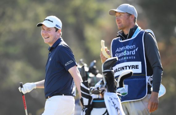 Robert MacIntyre and caddie Mike Thomson.