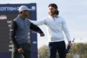 Tommy Fleetwood congraultates Aaron Rai after the play-=off at The Renaissance.