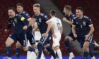Scotland stars celebrate shoot-out win over Israel.