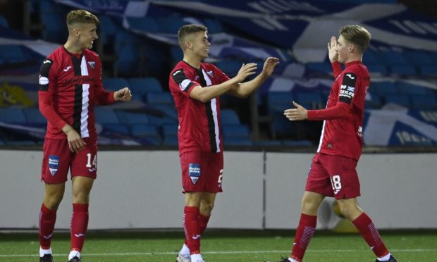 Dunfermline's Fraser Murray (centre) celebrates his second goal at Rugby Park.