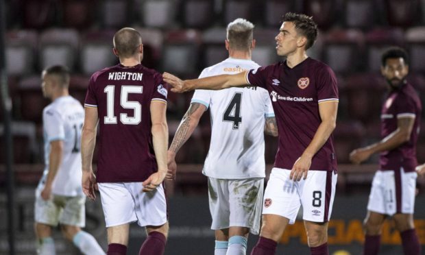 Hearts' Craig Wighton (L) and Olly Lee at full-time.